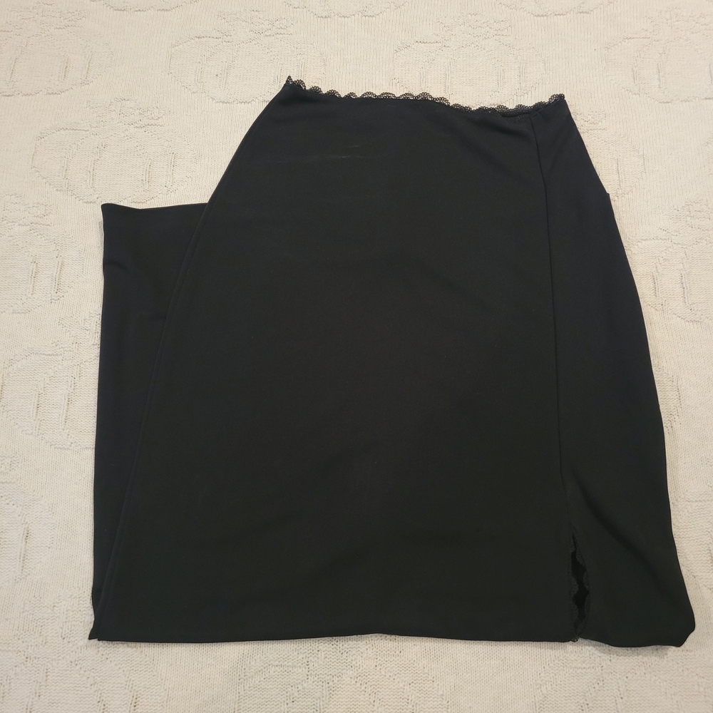 ★ . black midi skirt